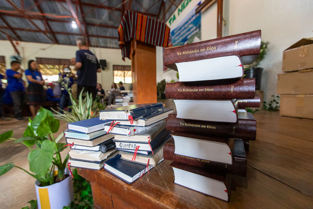 Stack of used New Testaments and the Isnag Bibles.